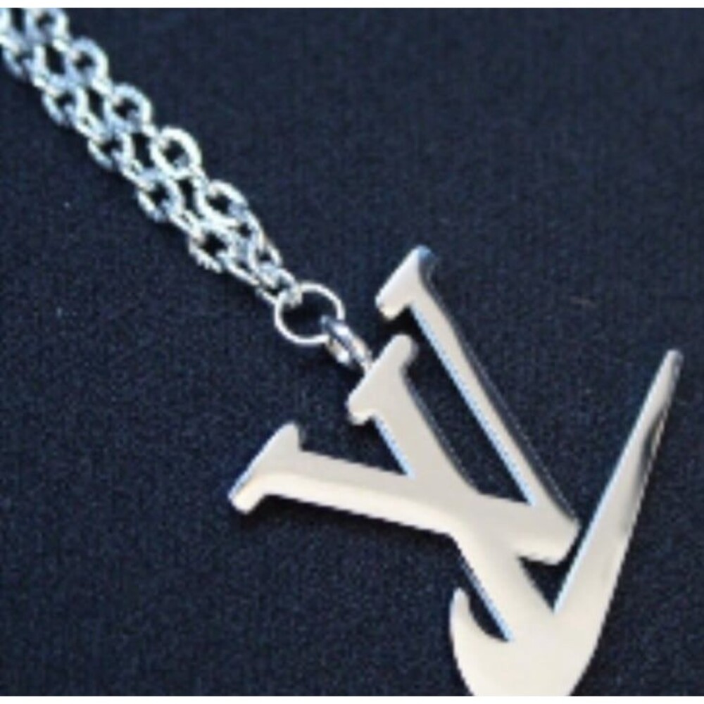NIKE: LV Swoosh Necklace Silver